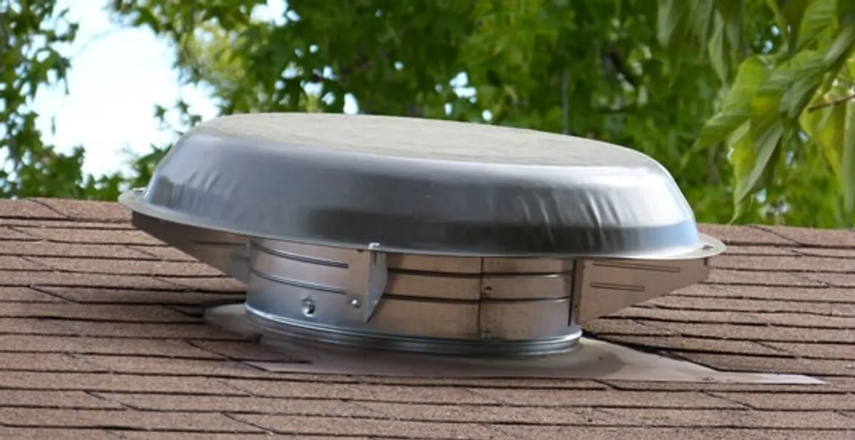 attic fan installation services with low-profile roof ventilation unit in Boca Raton, FL