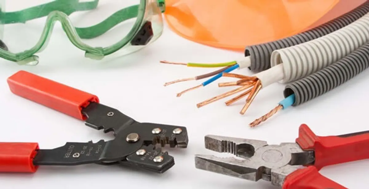 Electrical wiring repair with professional tools and safety equipment in Pompano Beach, FL