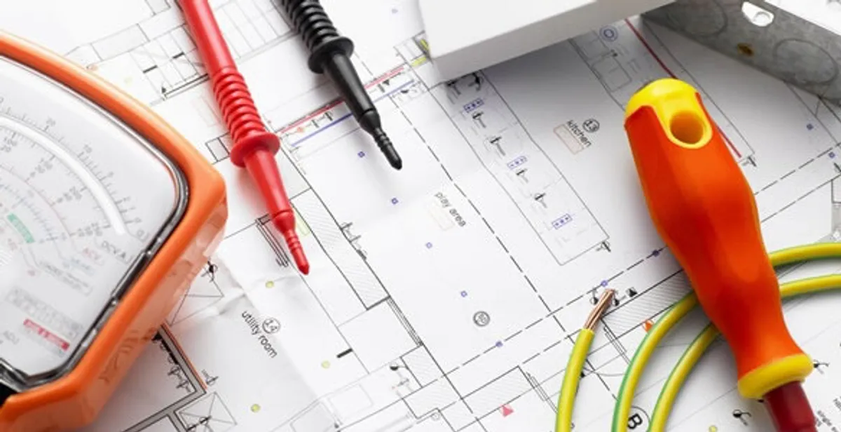 licensed electrician planning and testing electrical systems using professional tools in Boca Raton, FL