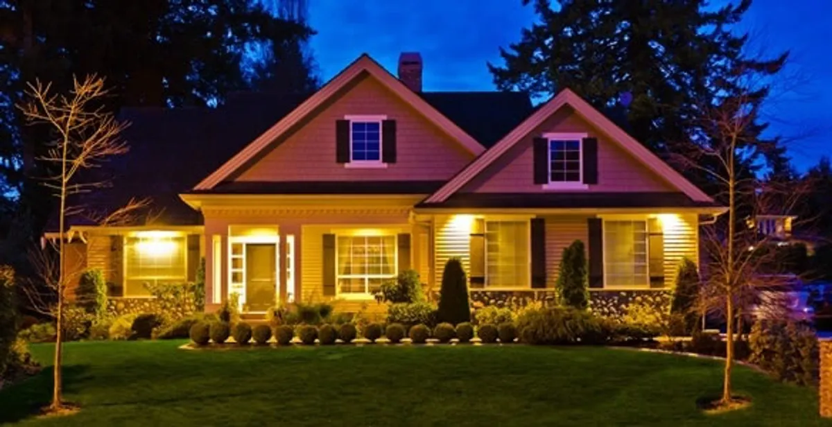 security light installation services illuminating a residential exterior at night in Boca Raton, FL