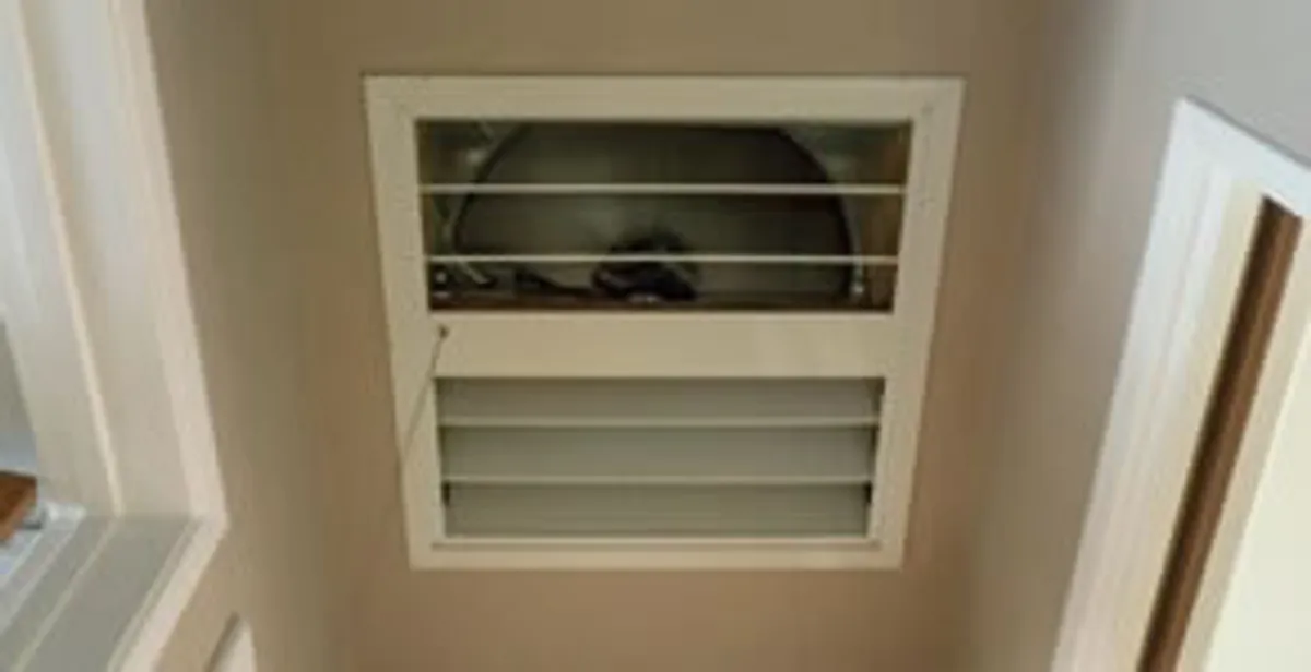 whole house fan installation services with ceiling-mounted ventilation system in Boca Raton, FL
